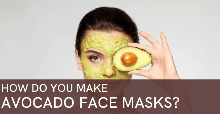 woman with avocado face mask holding avocado
