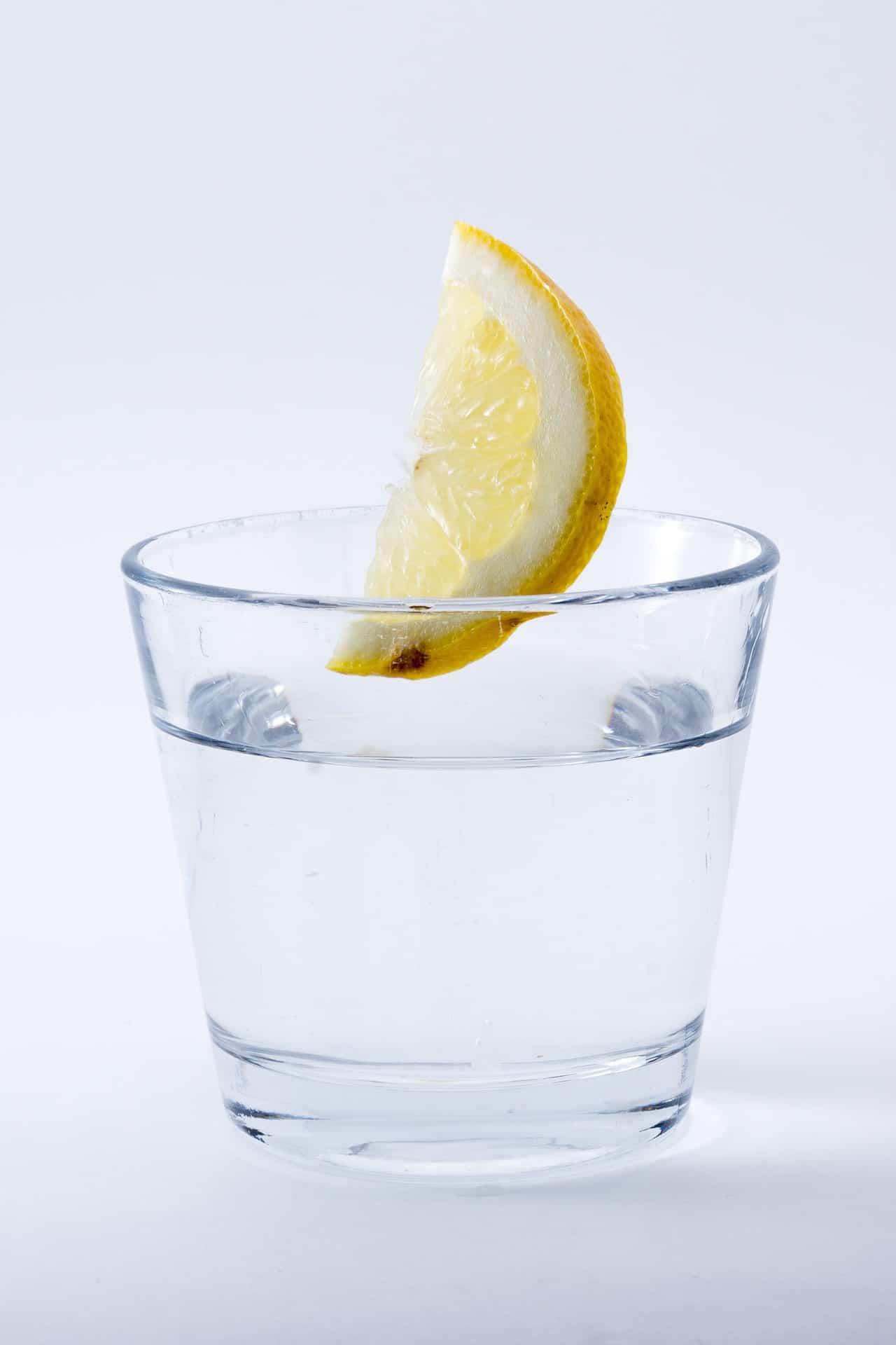 glass of water with a slice of lemon